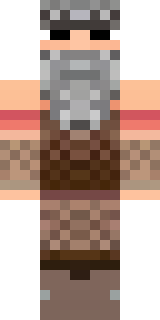 a viking warrior in fur and iron with a braided beard