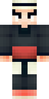 a sushi master in a dark apron with a headband