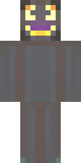 a Halloween pumpkin-headed figure in a dark cloak