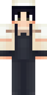 a sushi master in a dark apron with a headband
