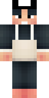 a sushi master in a dark apron with a headband