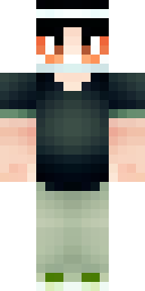 a sushi master in a dark apron with a headband