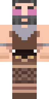 a viking warrior in fur and iron with a braided beard