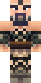 a viking warrior in fur and iron with a braided beard