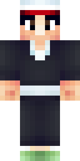 a sushi master in a dark apron with a headband
