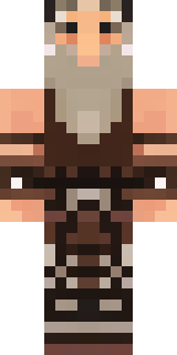 a viking warrior in fur and iron with a braided beard