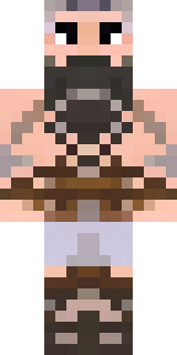a viking warrior in fur and iron with a braided beard