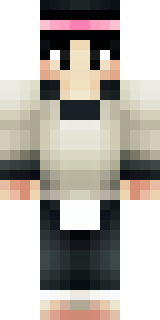 a sushi master in a dark apron with a headband