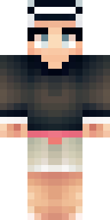 a sushi master in a dark apron with a headband