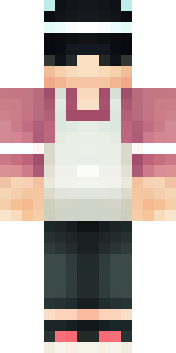 a sushi master in a dark apron with a headband