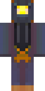 a Halloween pumpkin-headed figure in a dark cloak