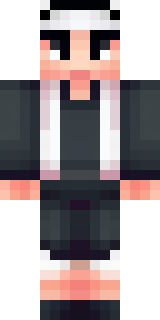 a sushi master in a dark apron with a headband