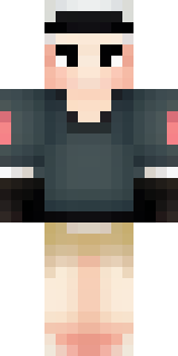 a sushi master in a dark apron with a headband