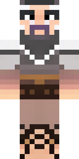 a viking warrior in fur and iron with a braided beard