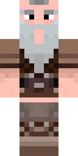 a viking warrior in fur and iron with a braided beard
