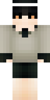 a sushi master in a dark apron with a headband