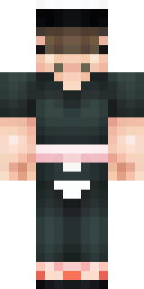 a sushi master in a dark apron with a headband