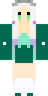 a queen in a flowing emerald gown with a silver tiara