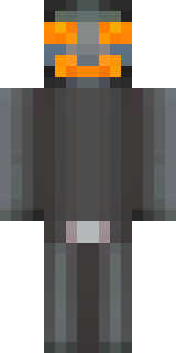 a Halloween pumpkin-headed figure in a dark cloak