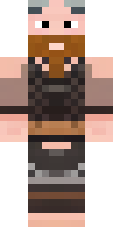 a viking warrior in fur and iron with a braided beard
