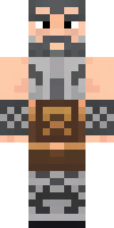 a viking warrior in fur and iron with a braided beard